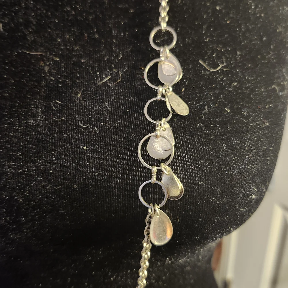 Elegant Silver Necklace with Charms